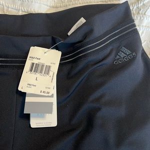 Adidas size Large work out pants black in color